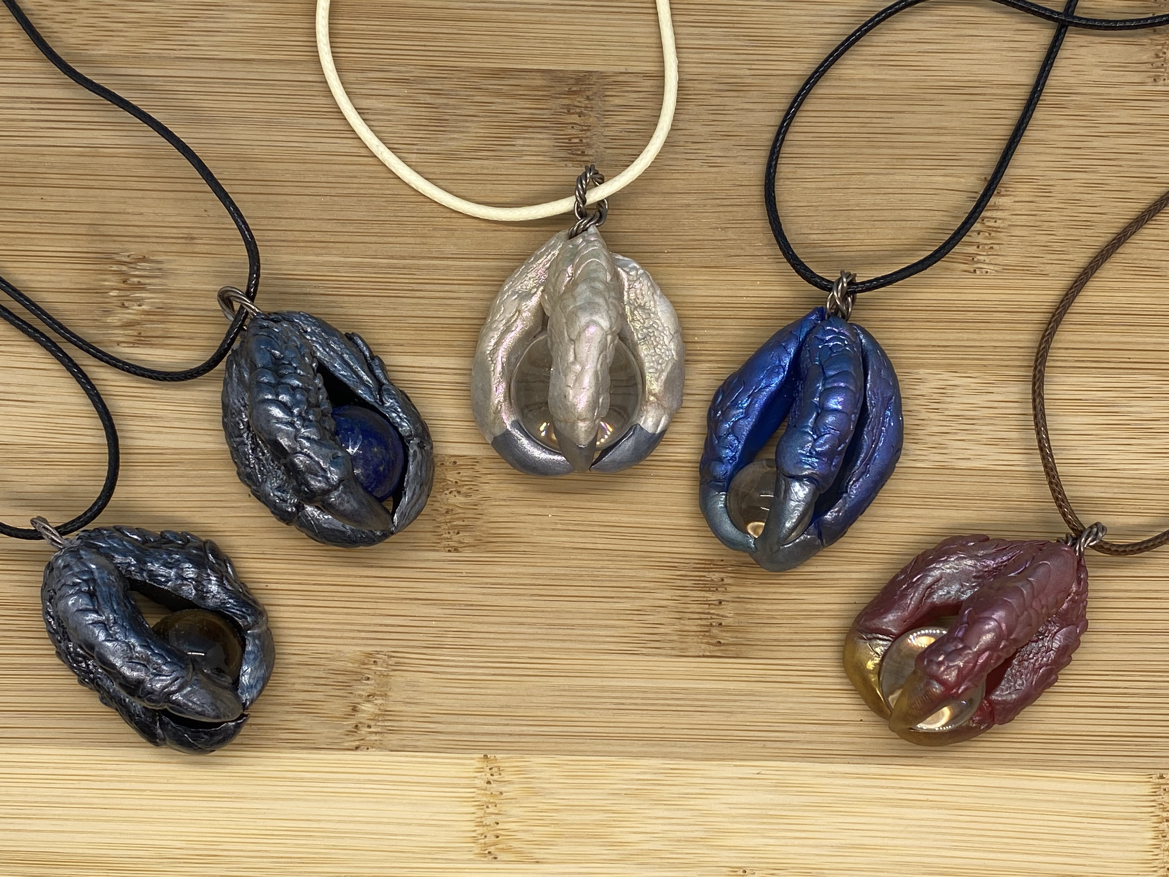 Dragon Claw pendants by Rachel Rehm